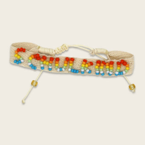 Gewebtes Armband mit handgearbeiteter Stickerei Schulkind natur mit Säckchen neongelb/natur