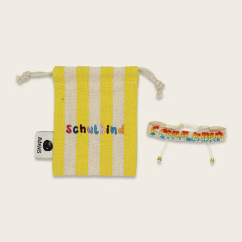 Gewebtes Armband mit handgearbeiteter Stickerei Schulkind natur mit Säckchen neongelb/natur