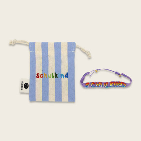 Gewebtes Armband mit handbestickten Perlen Schulkind, flieder mit Säckchen blau/weiss
